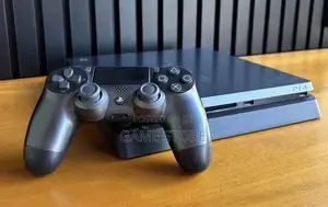 PS4 Slim Console with 12 Games and 2 Controllers