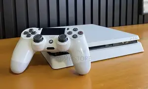 PS4 Slim Console with 12 Games & 2 Controllers
