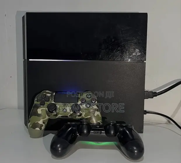 PS4 Standard Console with 12 Games & 2 Controllers - 1