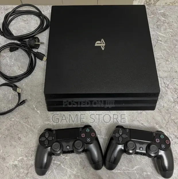 PS4 Pro Console with 12 Games & 2 Controllers - 1