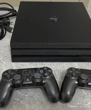 PS4 Pro with 12 Games and 2 Controllers