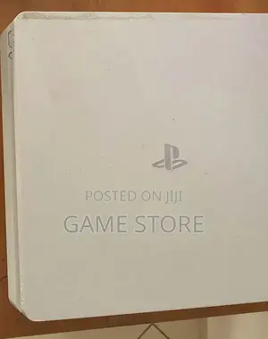 PS4 Slim Console with 12 Games and 2 Controllers