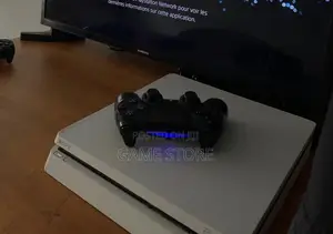 PS4 Slim Console with 12 Games & 2 Controllers
