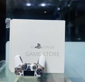 PS4 Slim Console with 12 Games & 2 Controllers