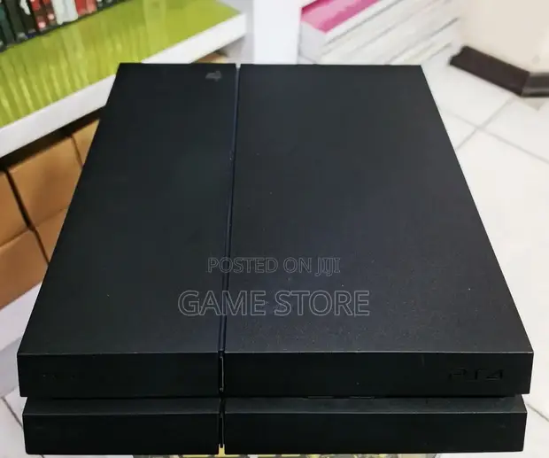PS4 Standard Console with 12 Games & 2 Controllers - 1