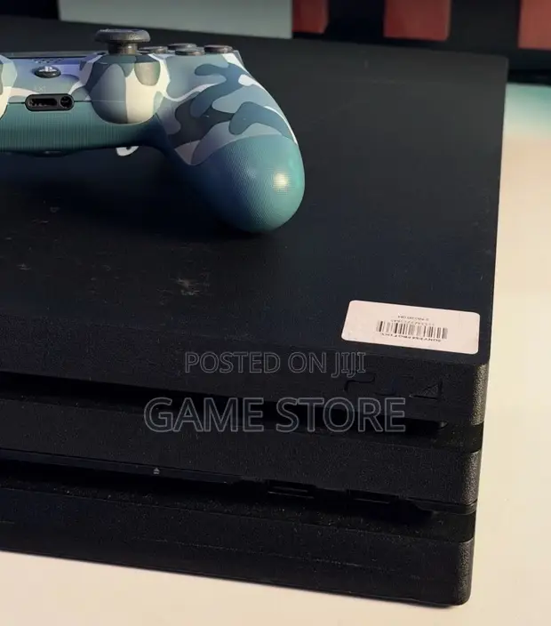 PS4 Pro with 12 Games and 2 Controllers - 1