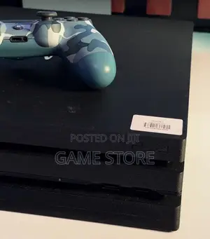 PS4 Pro with 12 Games and 2 Controllers