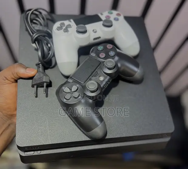 PS4 Slim Console with 12 Games & 2 Controllers - 1