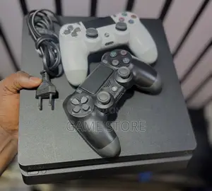 PS4 Slim Console with 12 Games & 2 Controllers