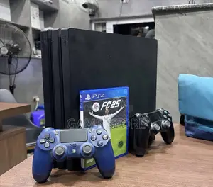 PS4 Pro Console with 12 Games & 2 Controllers