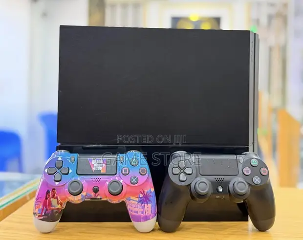PS4 Standard Console with 12 Games & 2 Controllers - 1