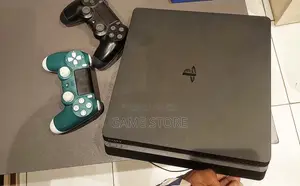 PS4 Slim Console with 12 Games and 2 Controllers