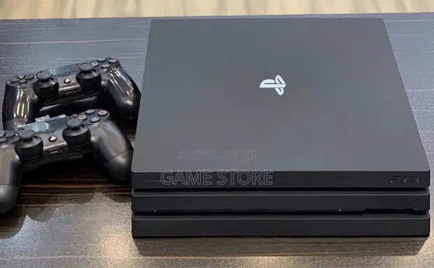 PS4 Pro with 12 Games and 2 Controllers - 1