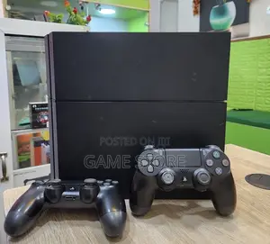 PS4 Standard Console with 12 Games and 2 Controllers