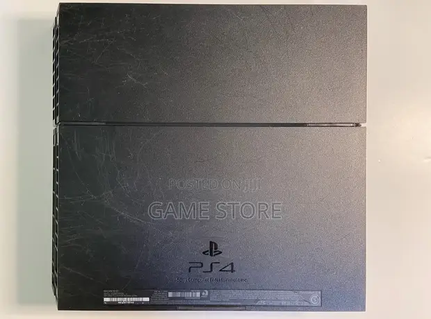 PS4 Standard Console with 12 Games & 2 Controllers - 1