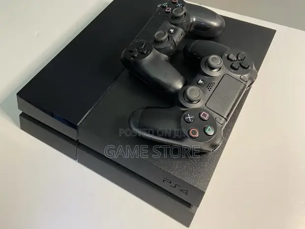 PS4 Standard Console with 12 Games & 2 Controllers - 1