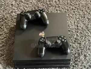 PS4 Pro with 12 Games, 2 Controllers