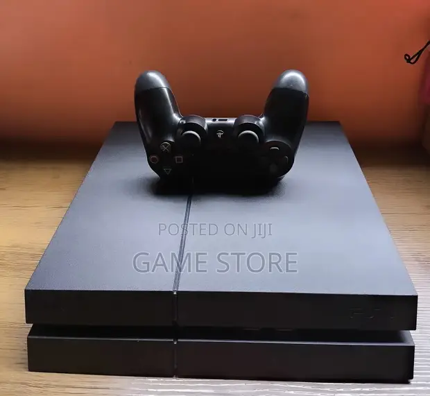 PS4 Slim Console with 12 Games & 2 Controllers - 1