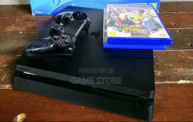 PS4 Slim Console with 12 Games and 2 Controllers - 1