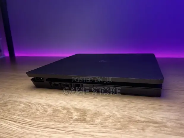 PS4 Slim Console with 12 Games & 2 Controllers - 1