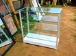Brand New Double-Sided Showcase with Wheels - 1