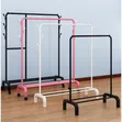 Metal Garment Rack with Wheels and Shoe Storage - 1