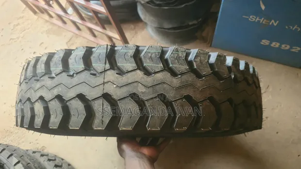 Brand New 8.25R16 LT Mudgrip Tires - 1