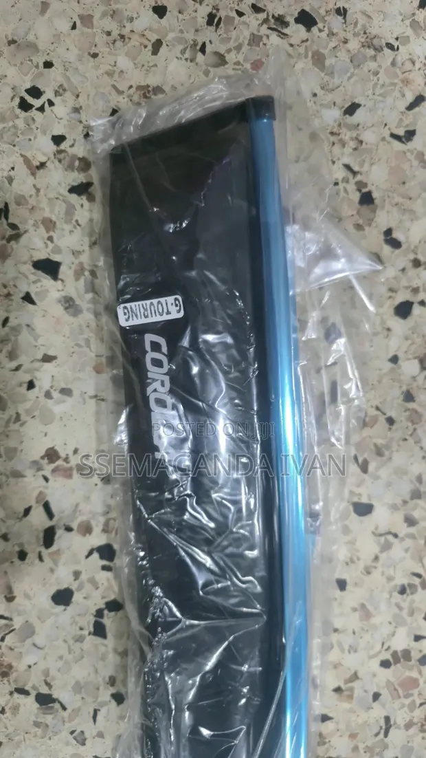 Toyota Corolla G Touring Rainguards with Moulding - 1