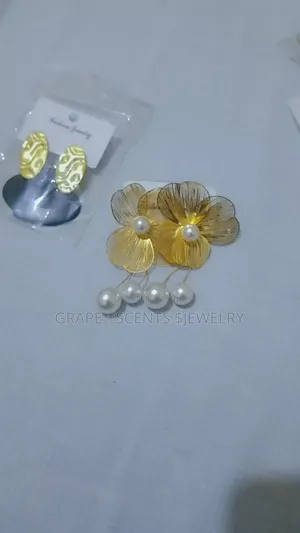 Gold Circle Earrings with Green Detail