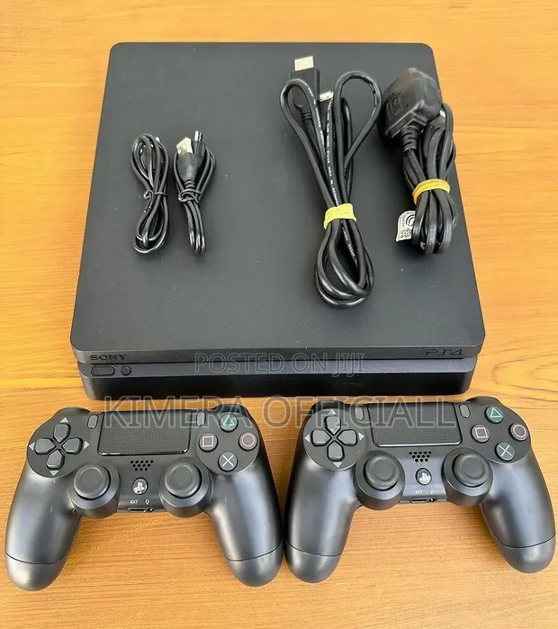 PS4 Slim Console with 13 Games & 2 Controllers - 1