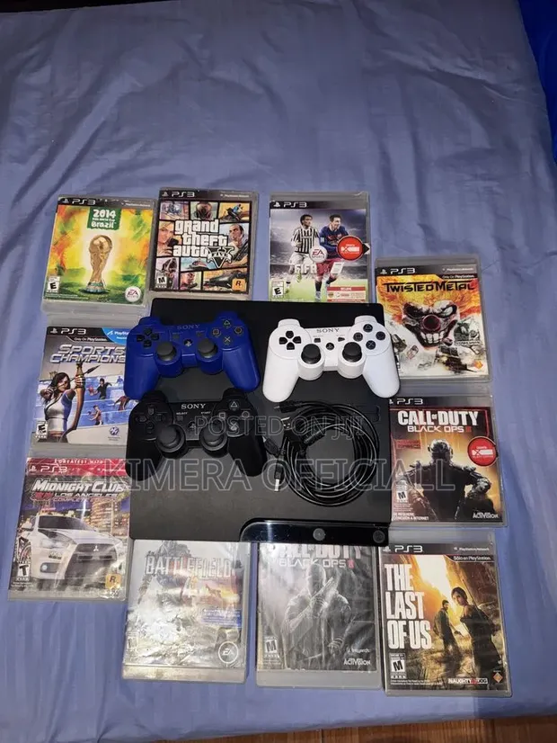 Sony PlayStation 3 Slim with 15 Games & 2 Controllers - 1