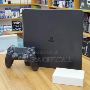 PS4 Slim Chipped Console with 12 Games & 2 Controllers