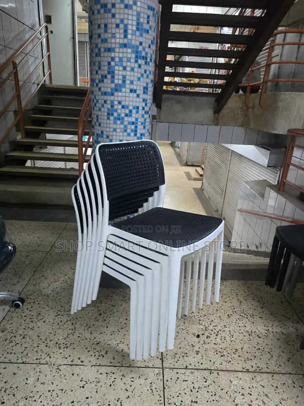 Stackable White and Black Plastic Chairs - 1