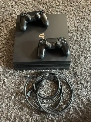 Sony PlayStation 4 Pro 1TB with 12 Games & 2 Controllers