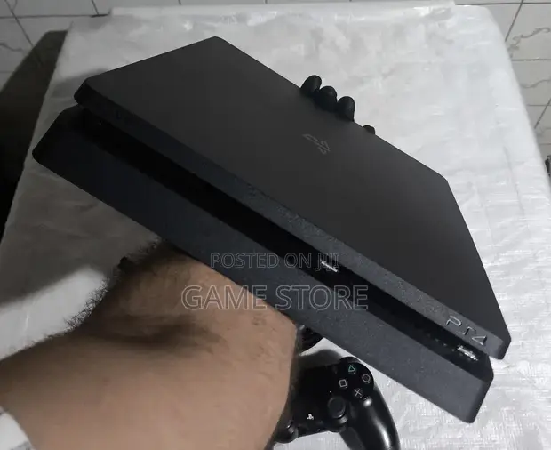 PS4 Fat Chipped Console with 12 Games & 2 Controllers - 1
