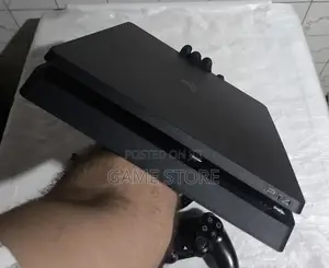 PS4 Fat Chipped Console with 12 Games & 2 Controllers