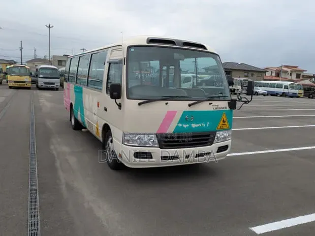 Toyota Coaster 2010 Beige - 1