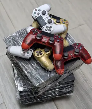 PS4 Fat Standard Console with 12 Games & 2 Controllers