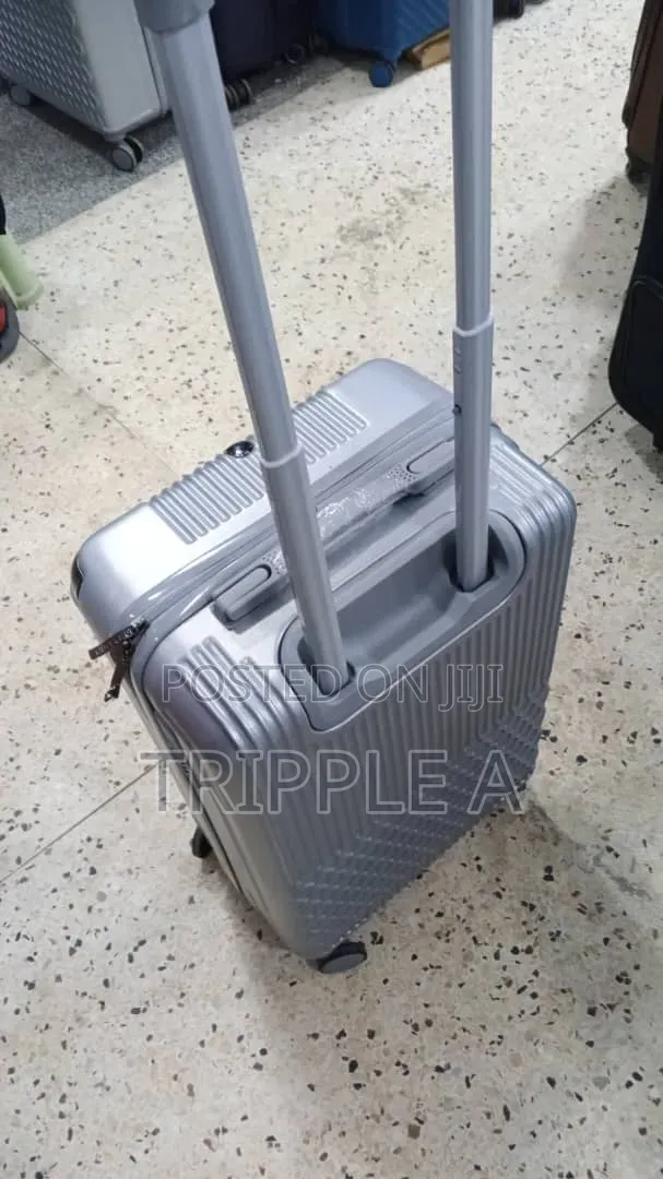 Small Silver Hardside Spinner Suitcase - 1