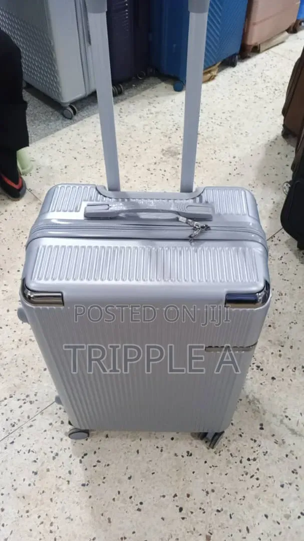 Medium Sleek Silver Hardshell Suitcase - 1