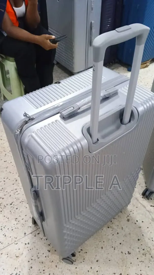 Large Silver Rubber Plastic Suitcase - 1