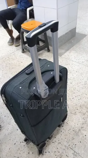 Feng Hua Medium Suitcase with Orange Branding