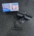 Brand New Suction Sit-Up Bar with Resistance Band - 1