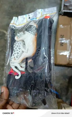 Plastic Toy Pistol with Leopard Figurine