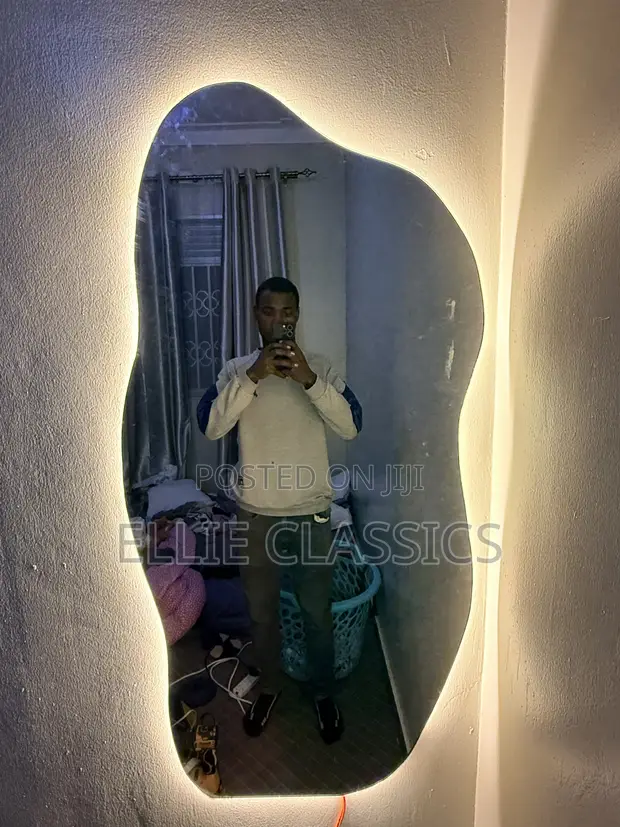 Shapeless Mirror with Warm Background Lights - 1
