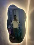 Shapeless Mirror with Warm Background Lights - 1