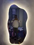 Shapeless Mirror with Warm Background Lights - 3