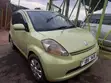 Toyota Passo 2006 Yellow - 4