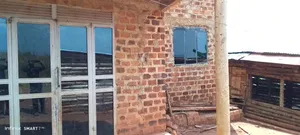 Plot with House and Title in Mpigi TC