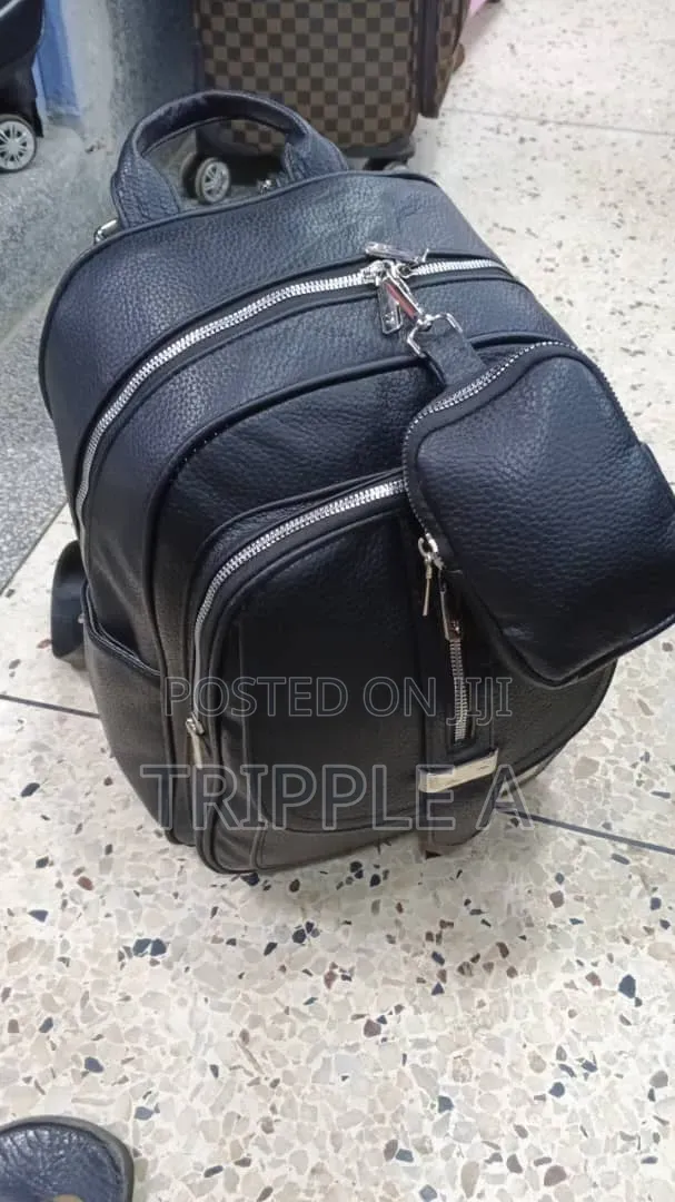 Black Pebble-Textured Faux Leather Backpack - 1